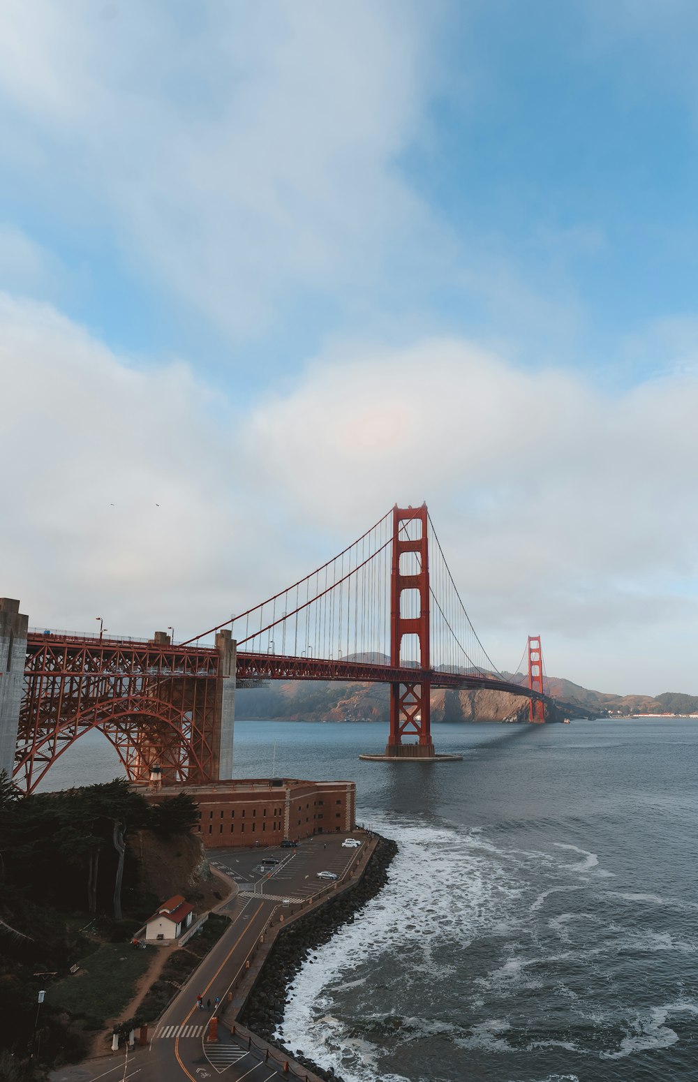 a red bridge over water