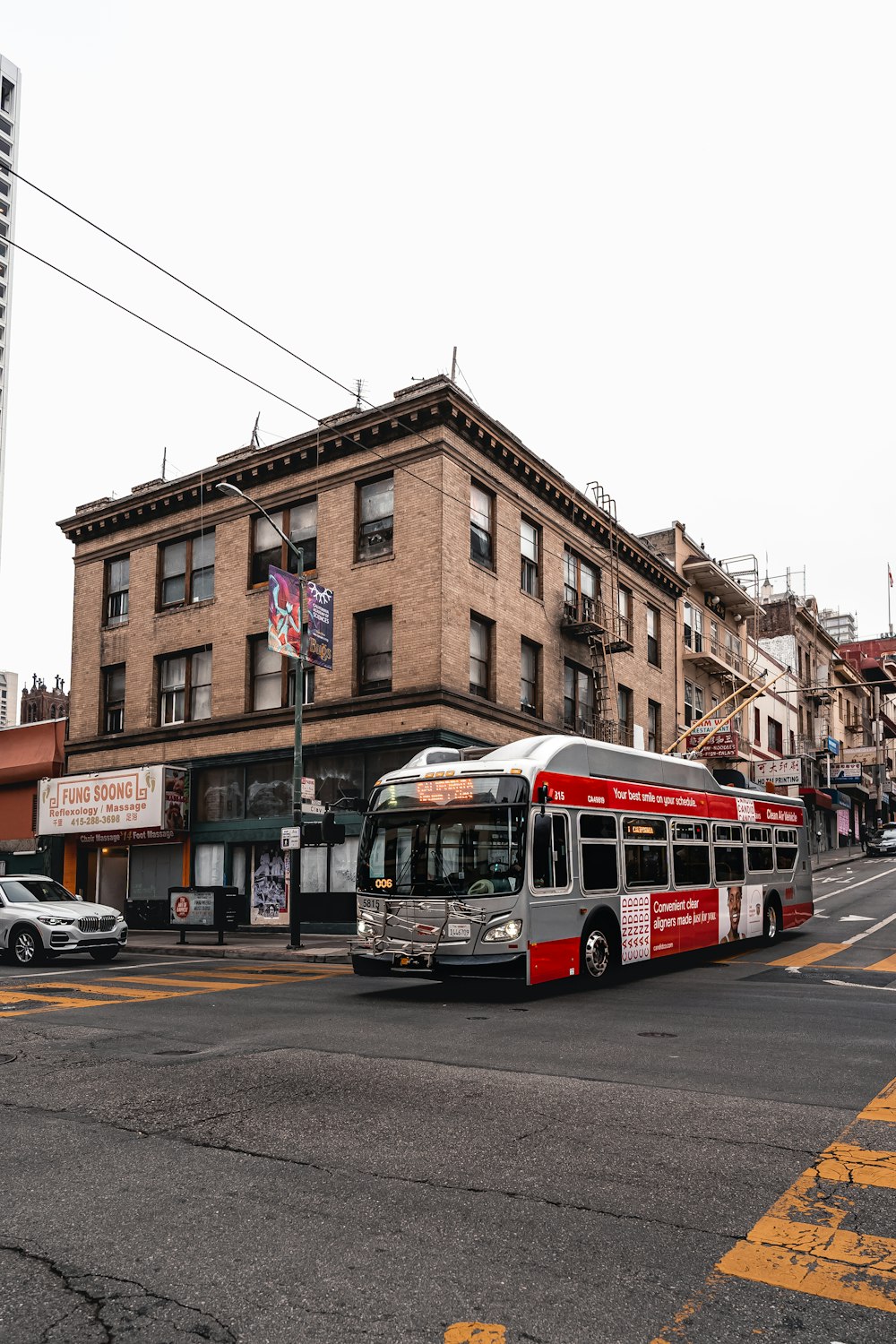 a bus driving down a street