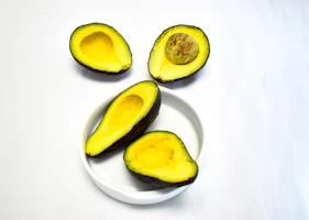 a group of sliced avocados