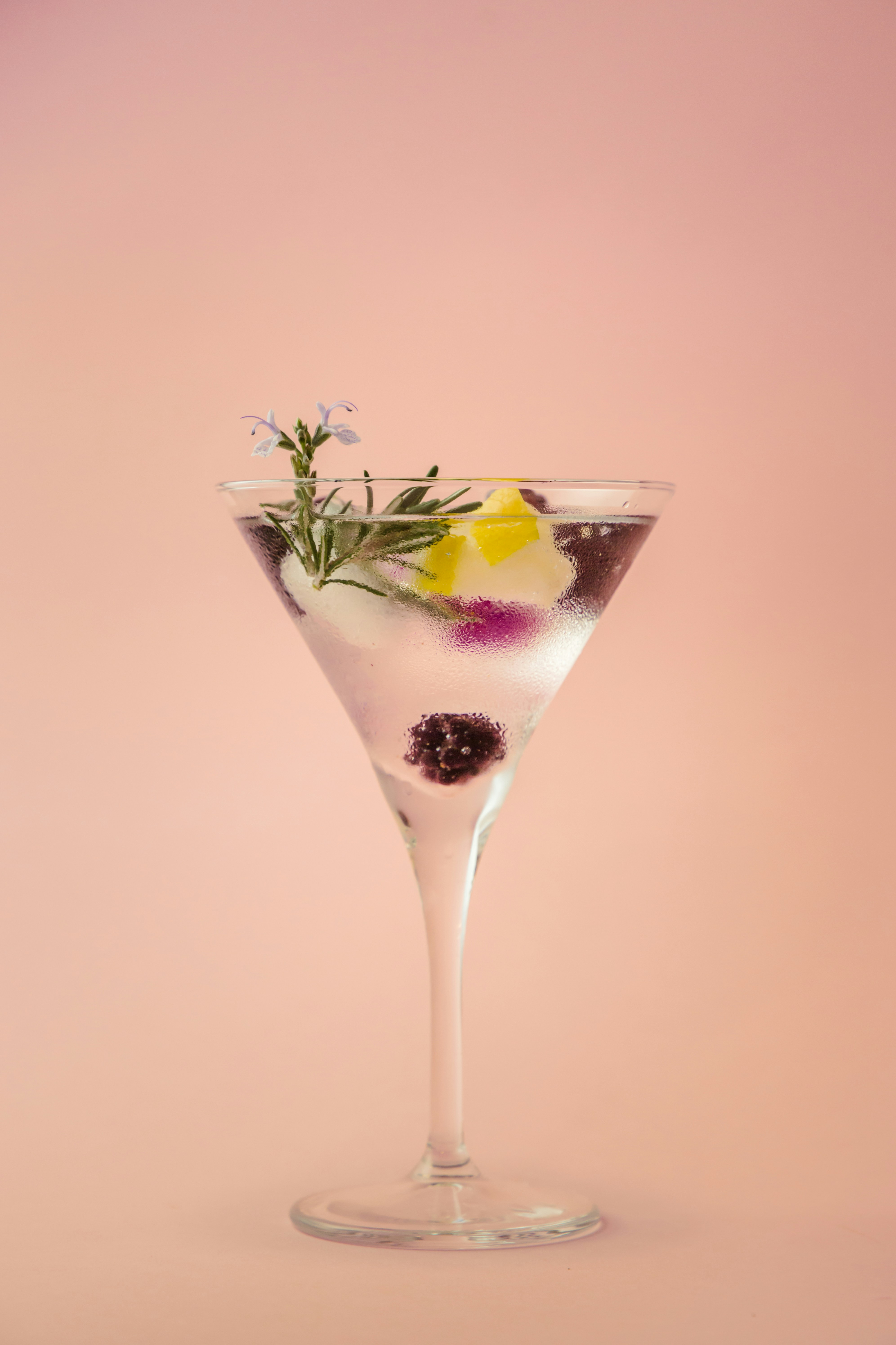 a glass with a drink in it