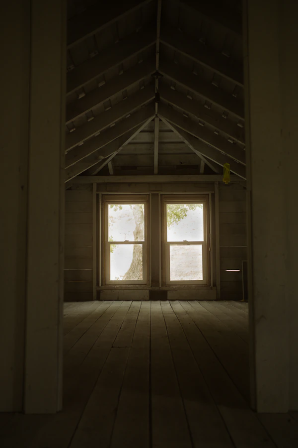 Room with a window and a wood floor
