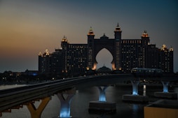 a city skyline with a bridge