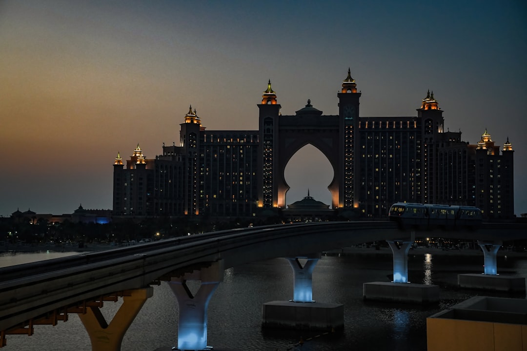 a city skyline with a bridge,