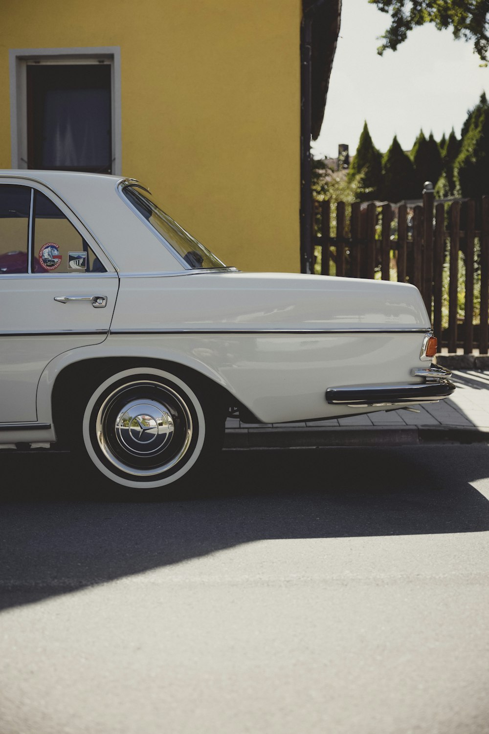 a car parked in front of a house