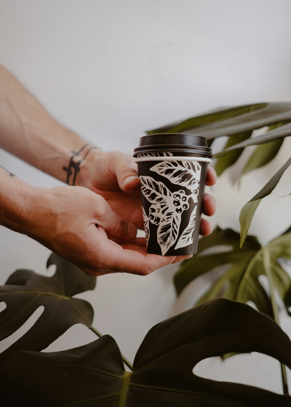 a person holding a jar