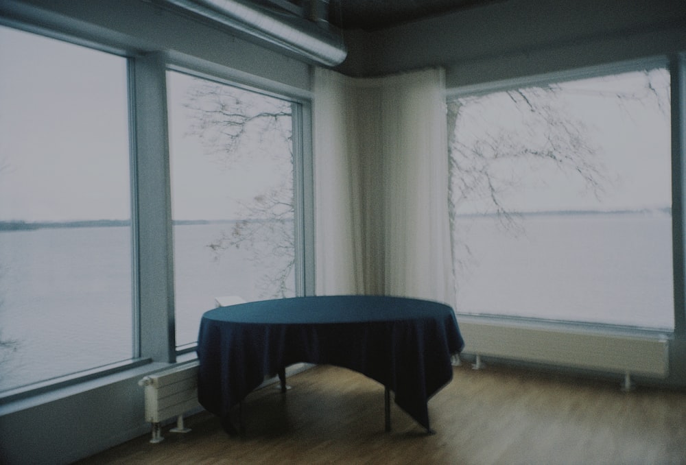a room with a table and a window