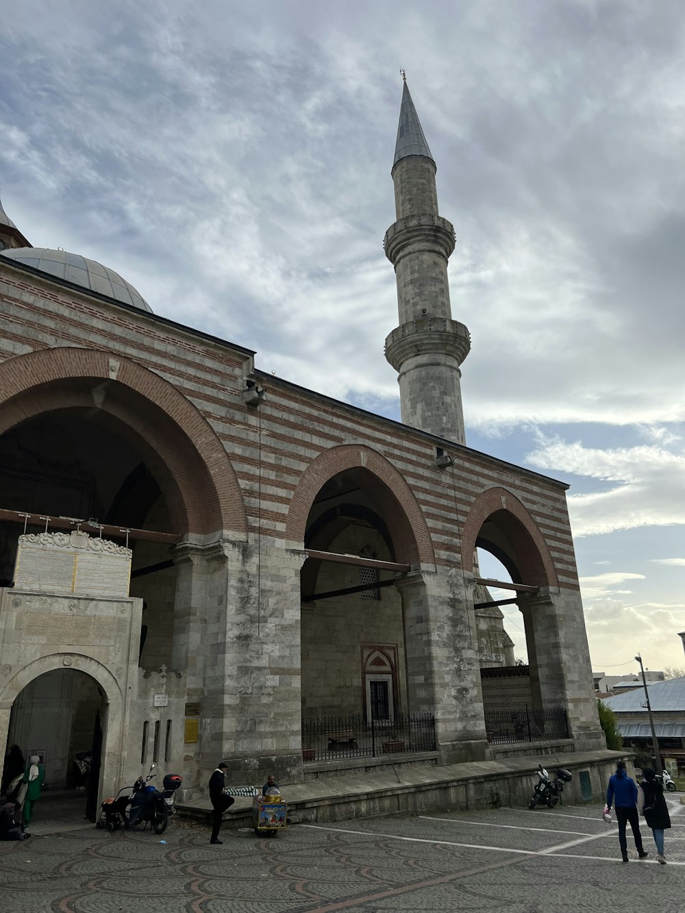 a large stone building with a tall tower