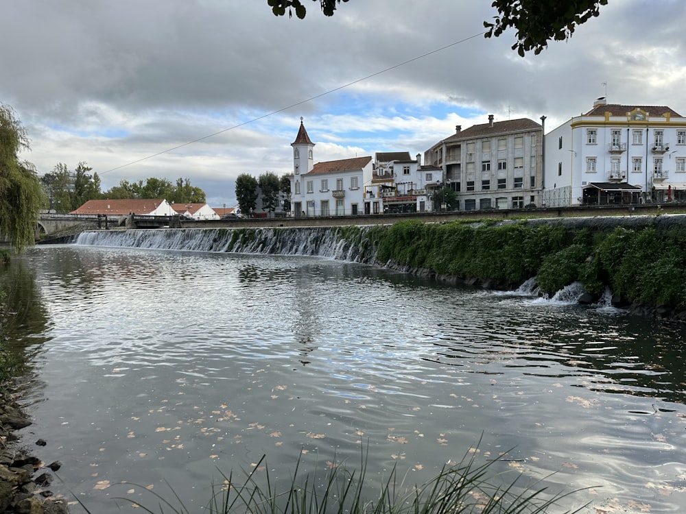 a river with buildings along it