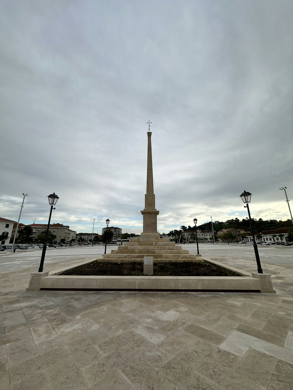 a tall monument in a plaza