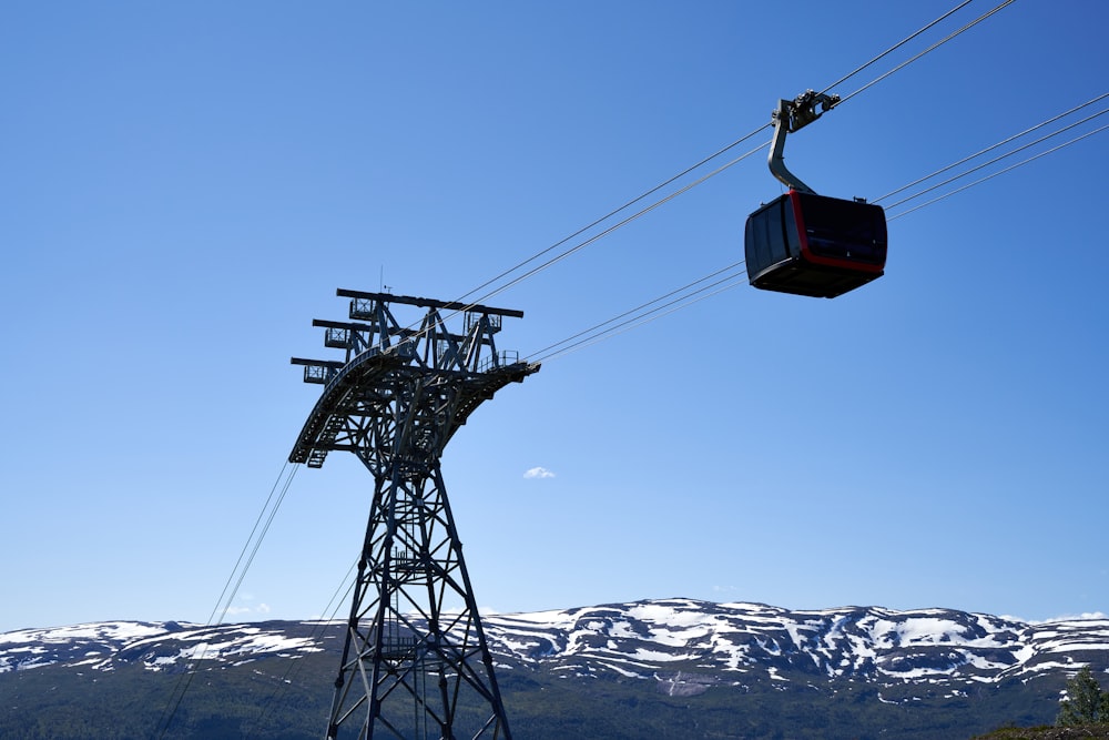 a cable car going up a mountain