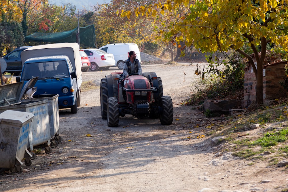 a person driving a tractor