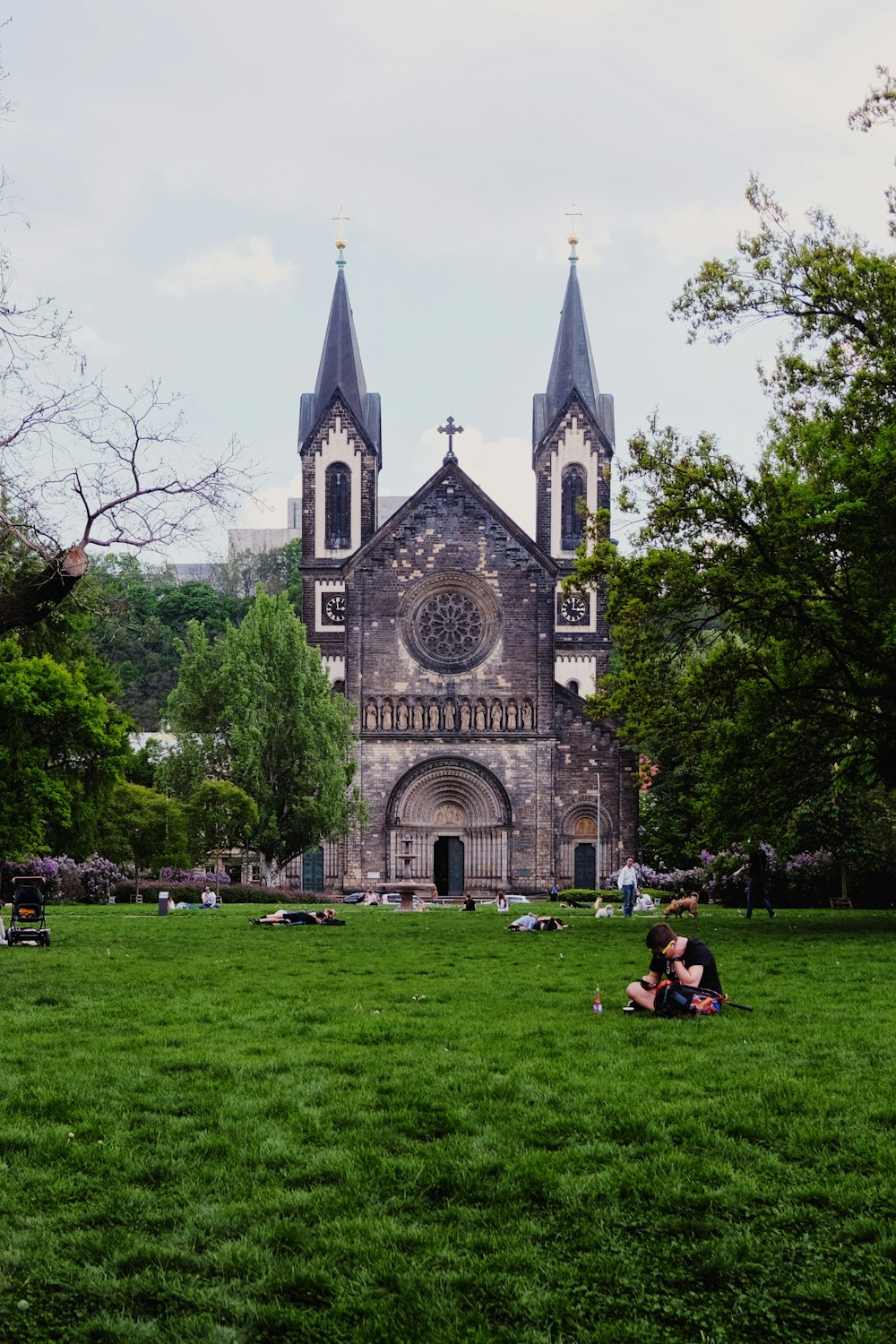 a church with a large lawn in front of it