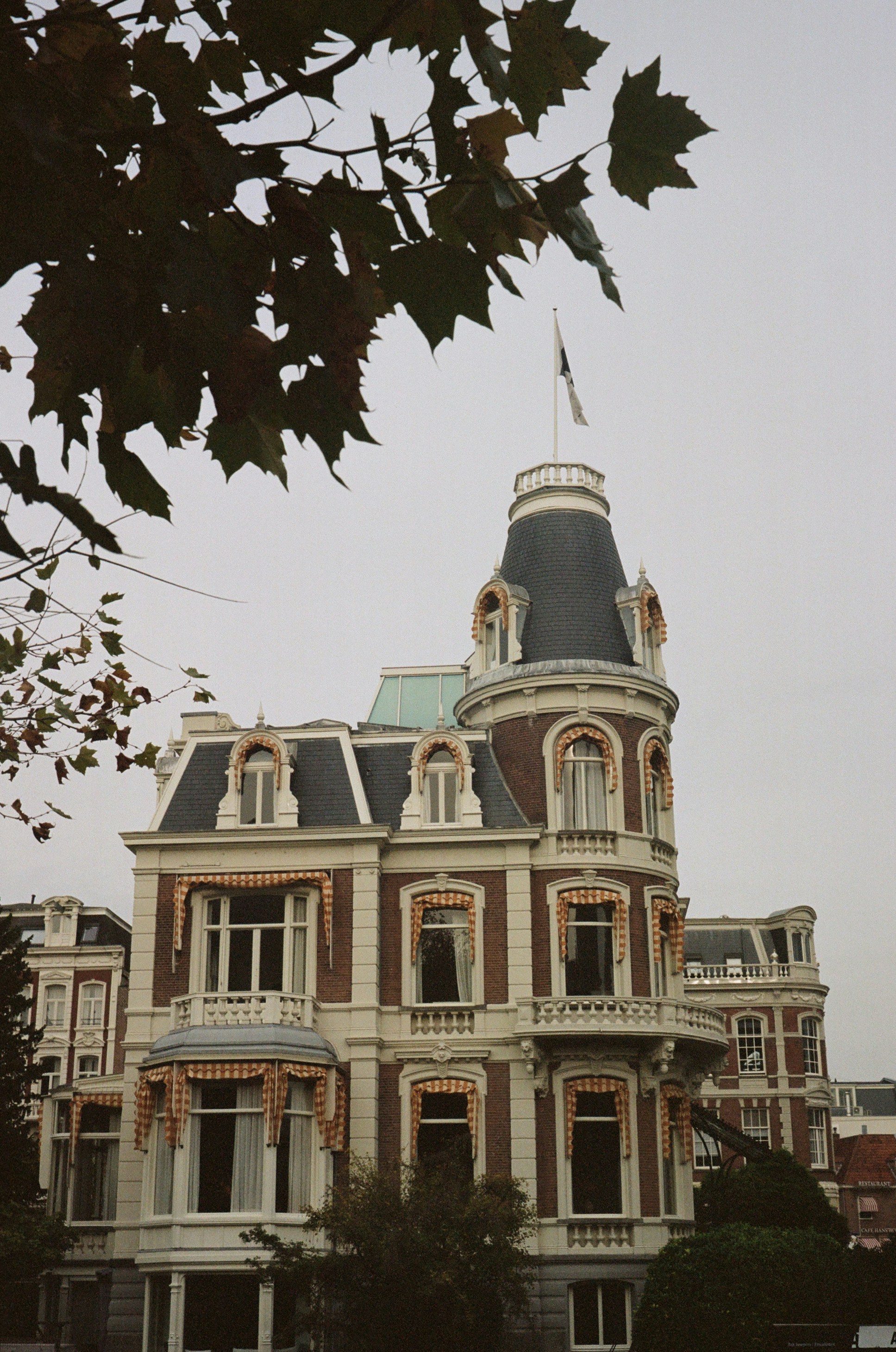 a large building with a flag on top