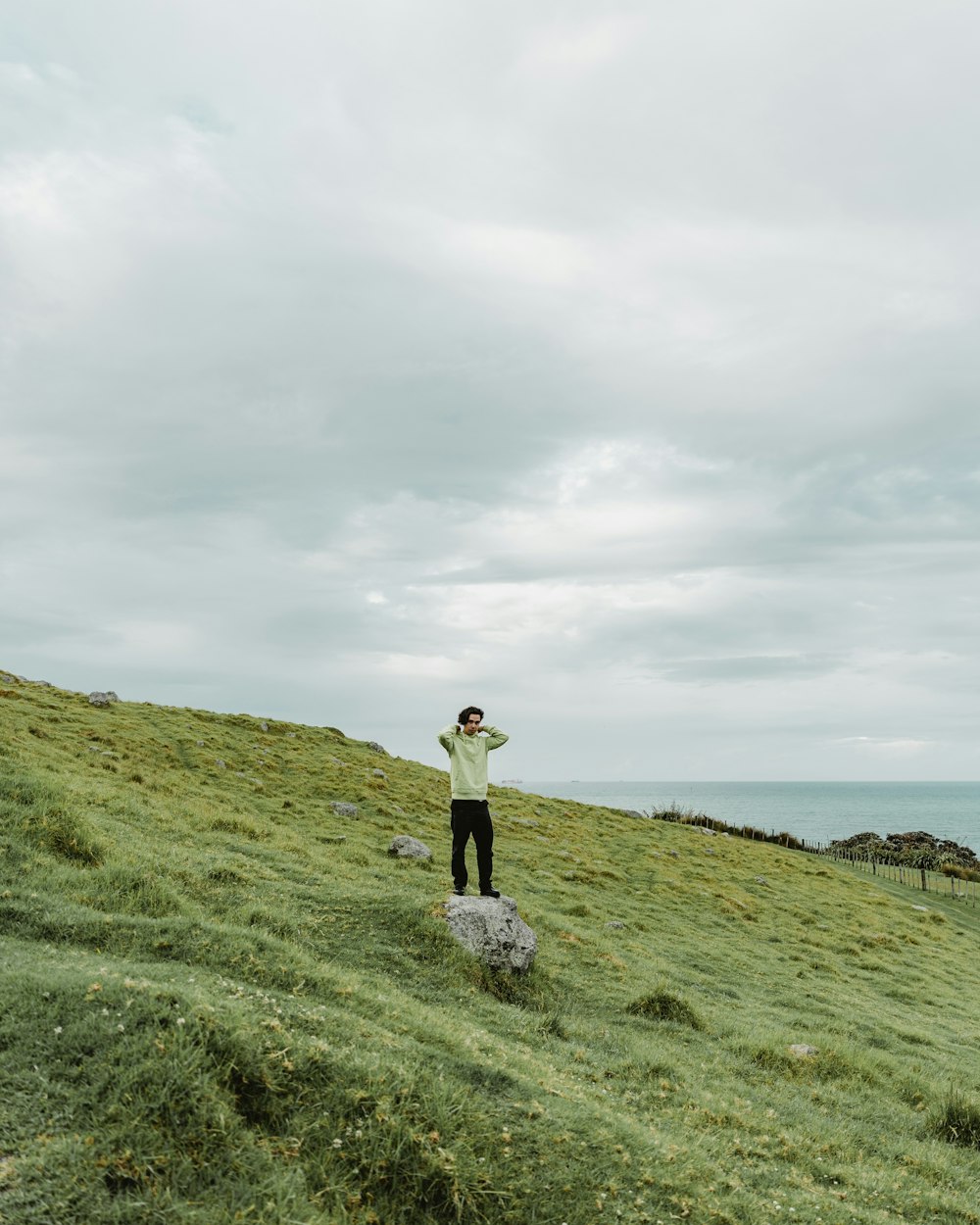 a person standing on a rock