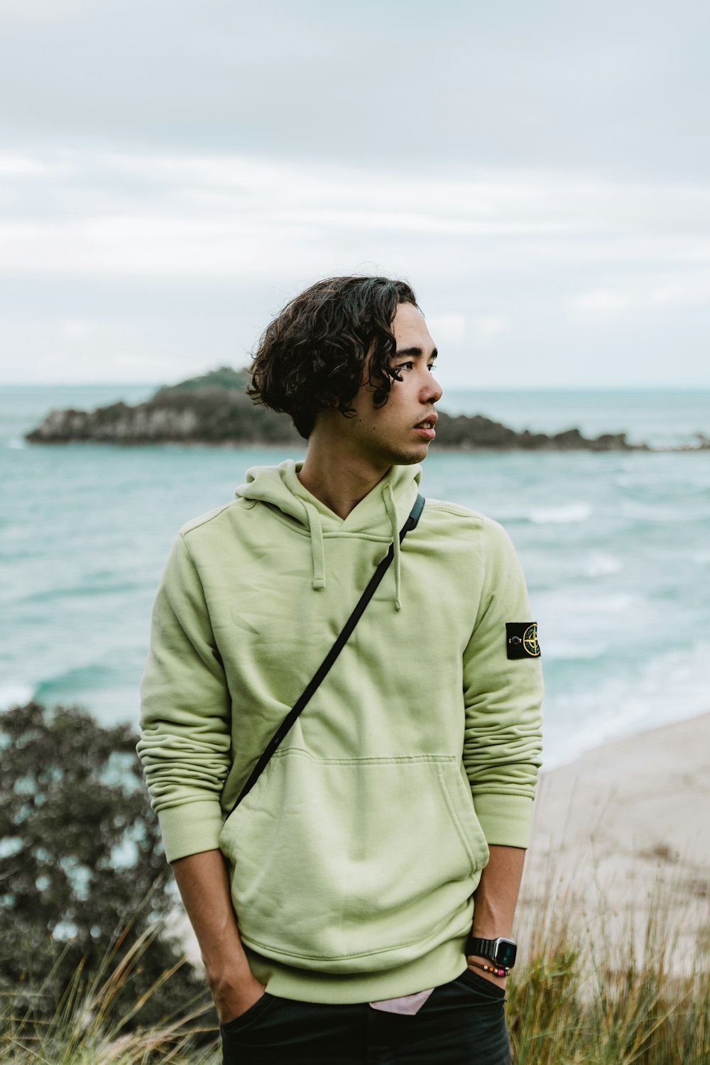 a man standing on a beach