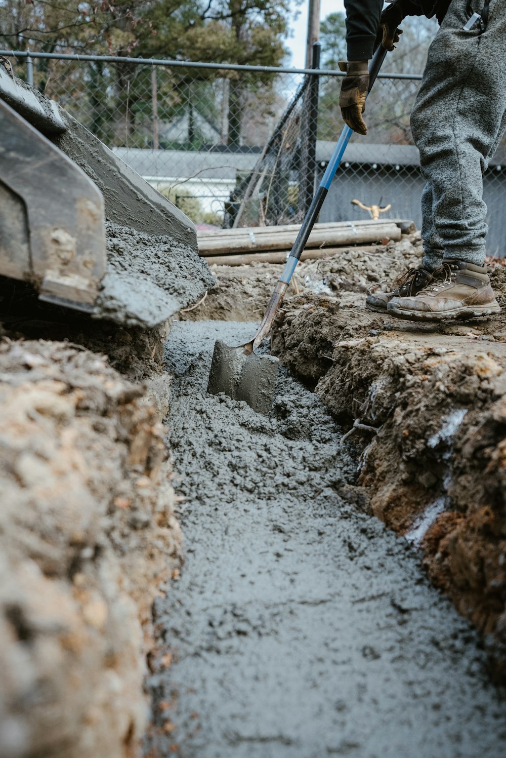 a person digging in the dirt