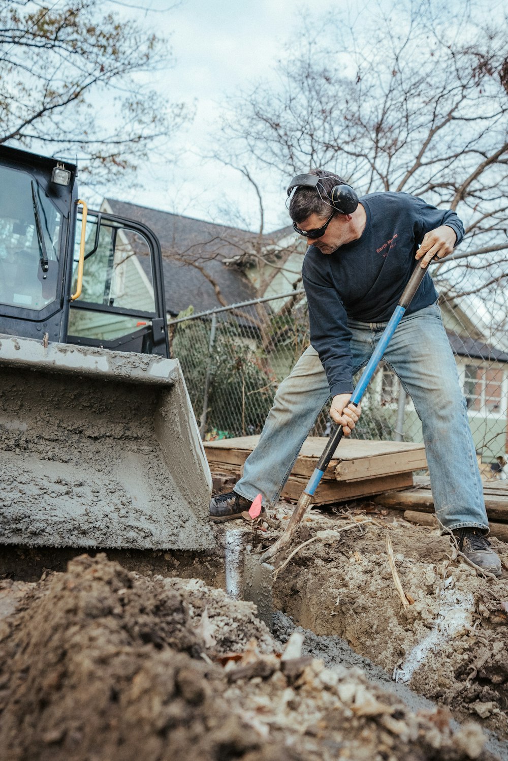 a man digging in the dirt