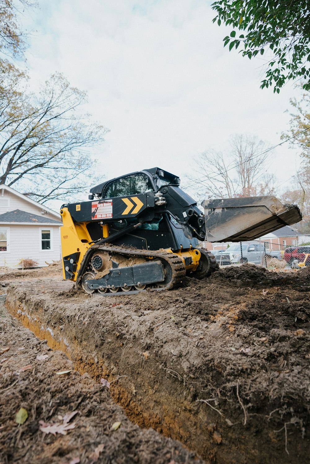 a bulldozer digging in dirt