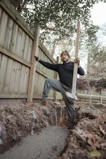 a man holding a shovel