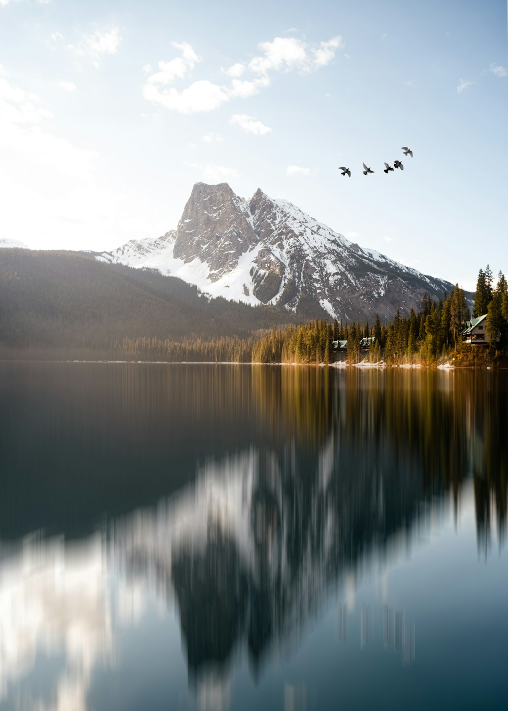 a lake with a mountain in the background