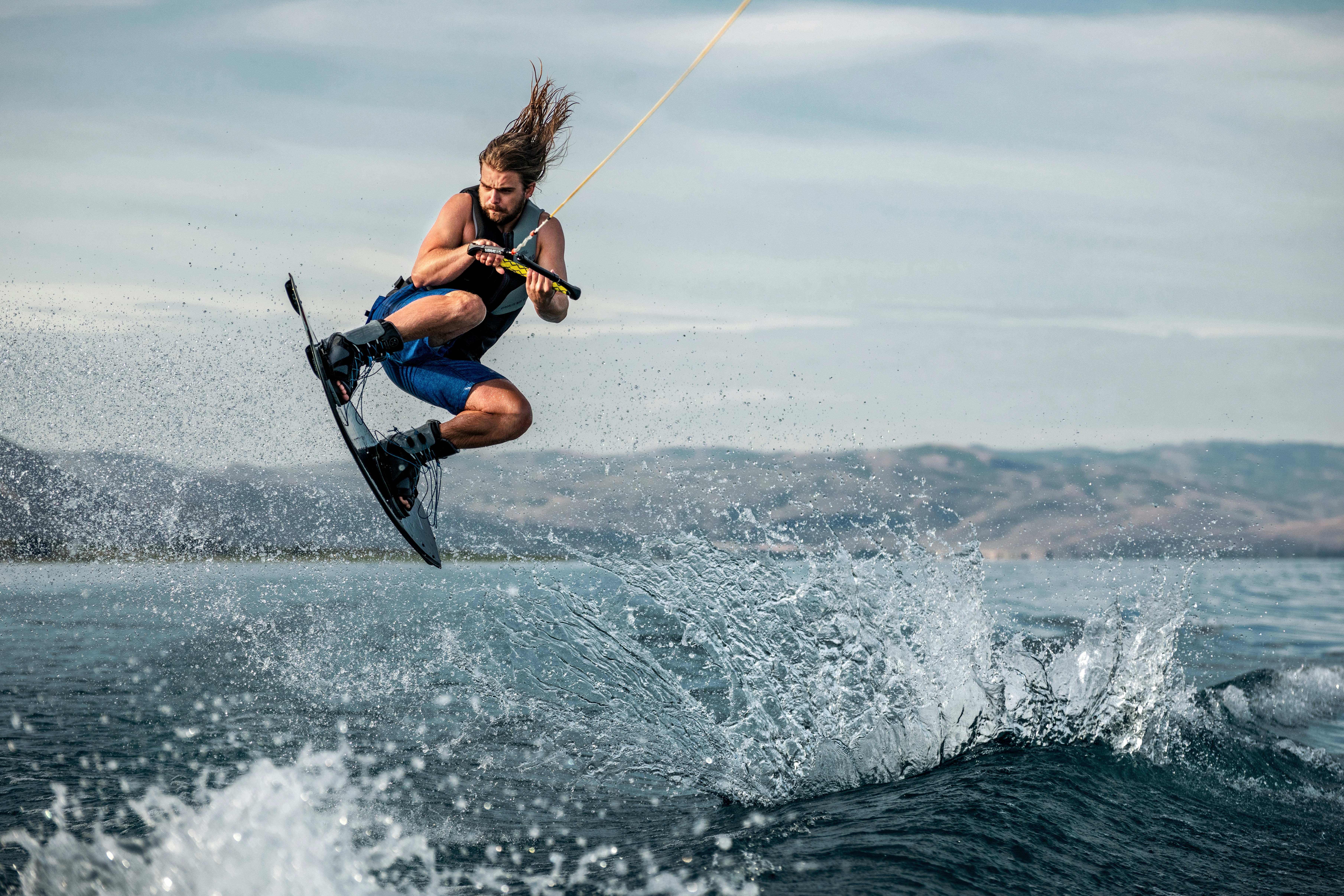 a man parasailing on a water ski