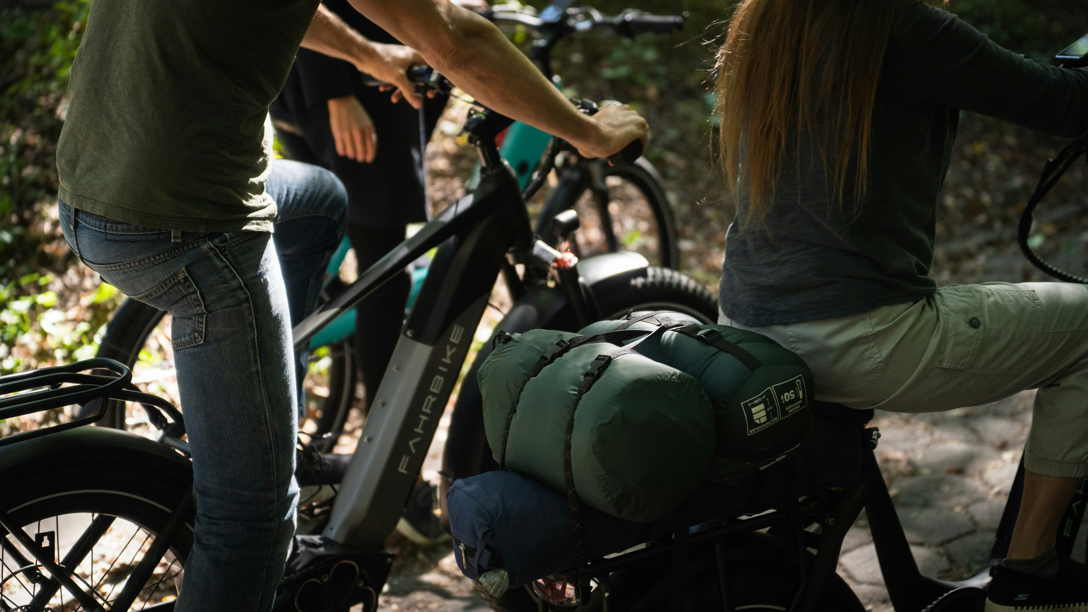 a group of people riding bikes