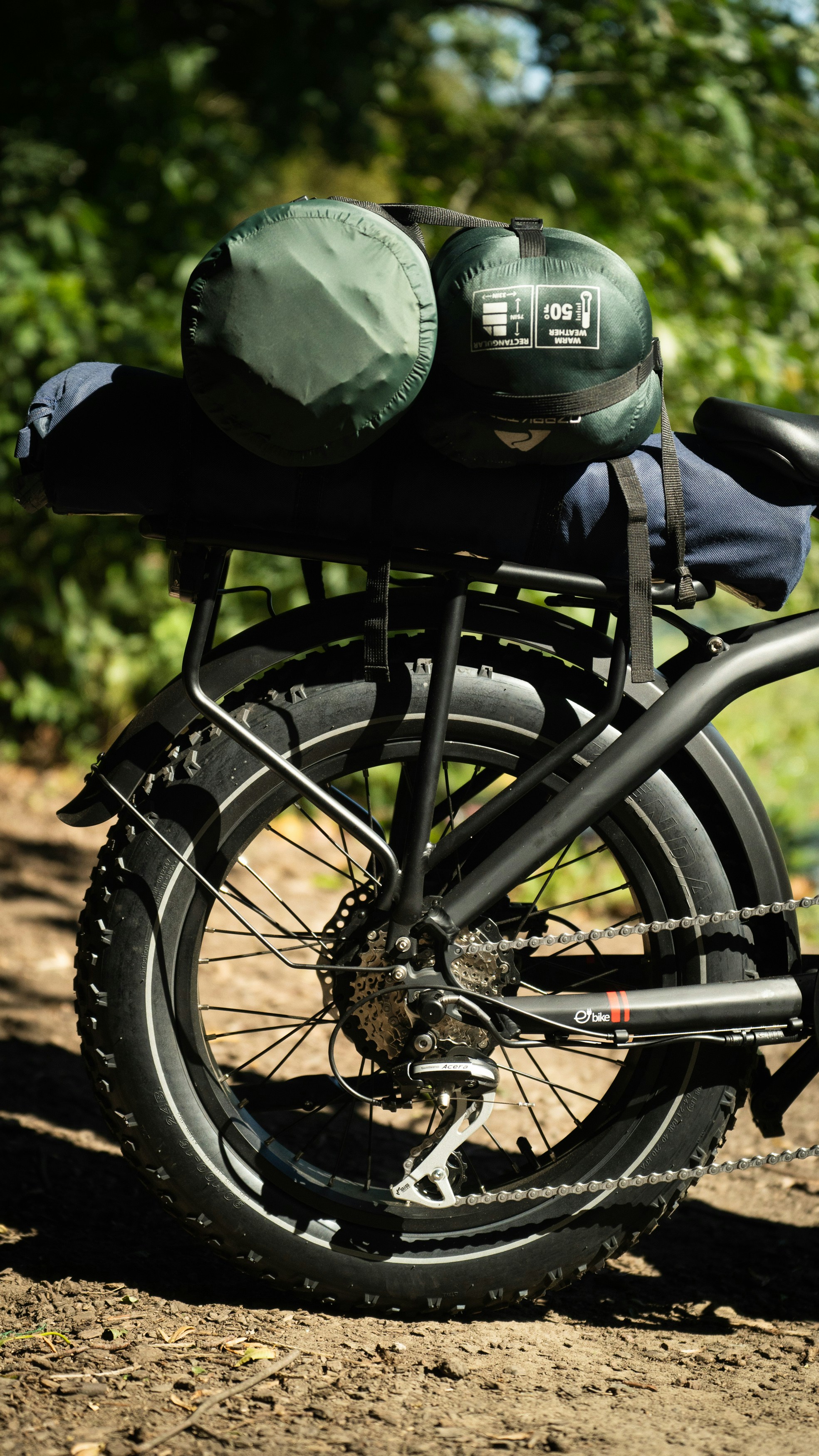 a black motorcycle with a helmet on it