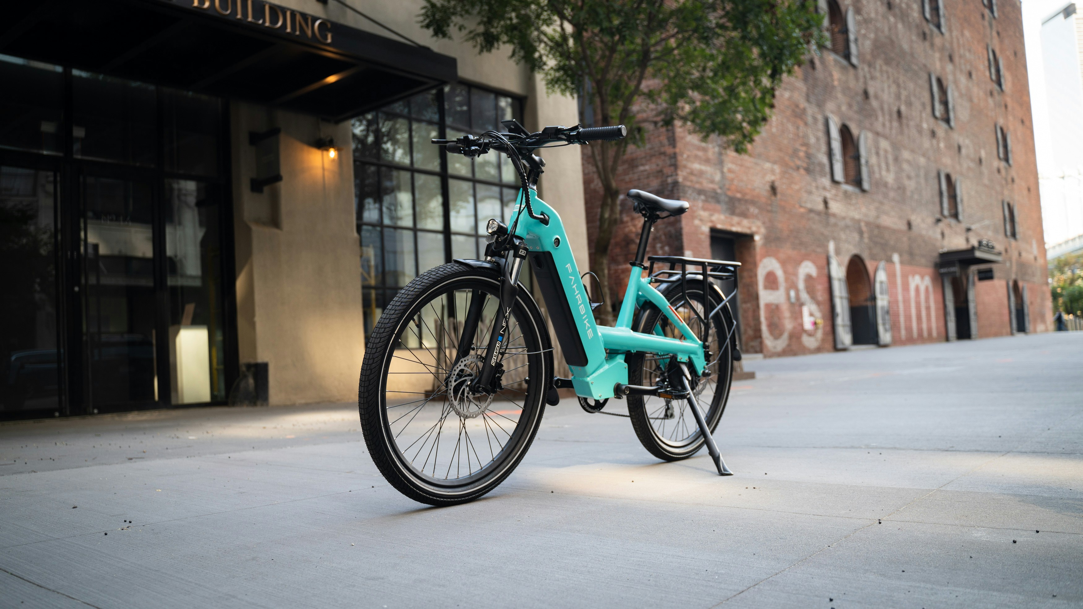 a bicycle parked on a sidewalk