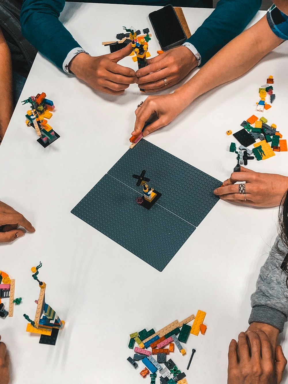 a group of people around a table