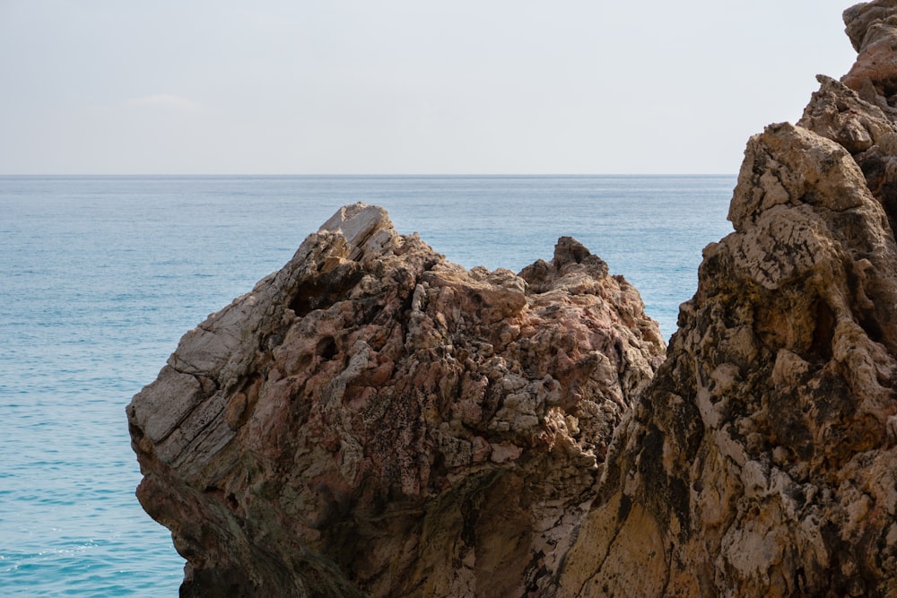 a rocky cliff overlooking the ocean