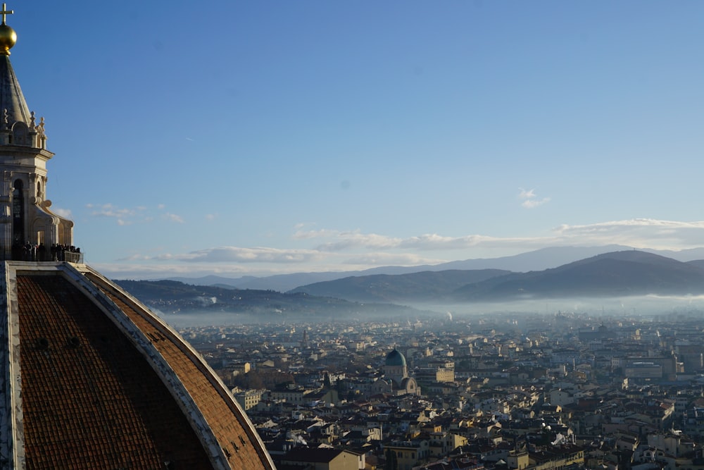 a city with mountains in the background