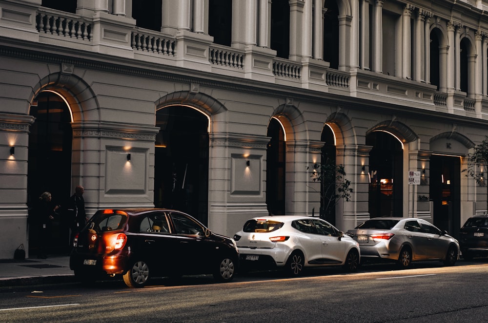 cars parked in front of a building