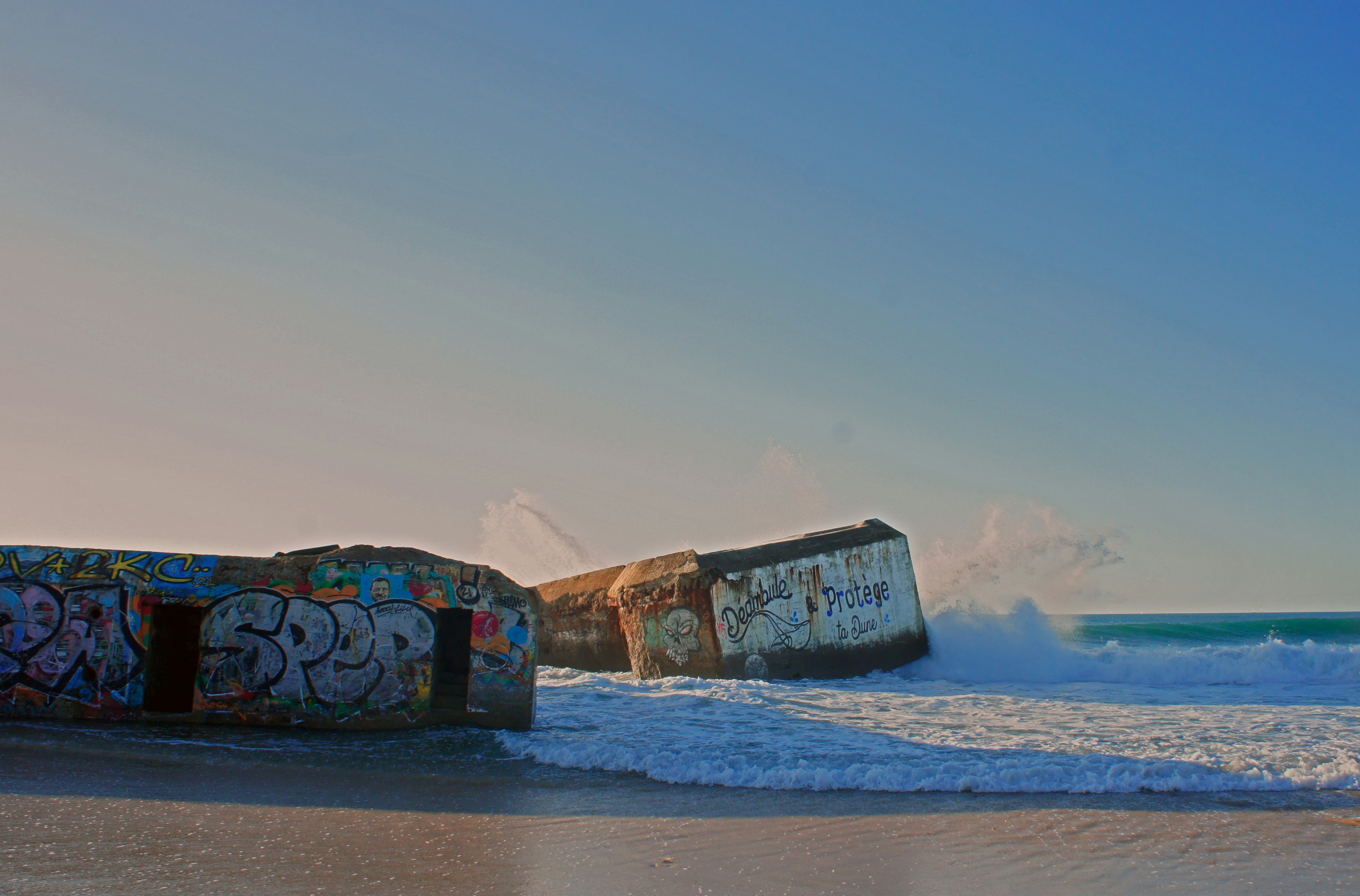 a beach with graffiti