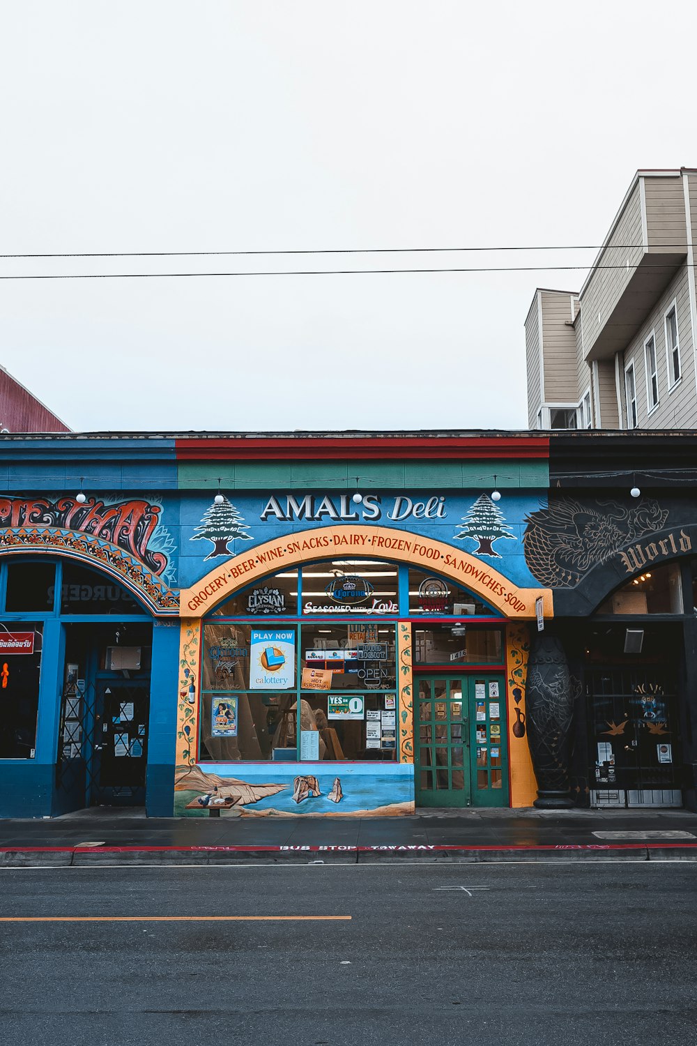 a blue building with a sign on it