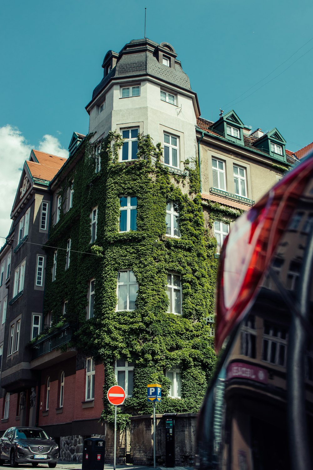 a large building with a tree in front of it