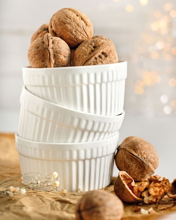 a white bucket of nuts