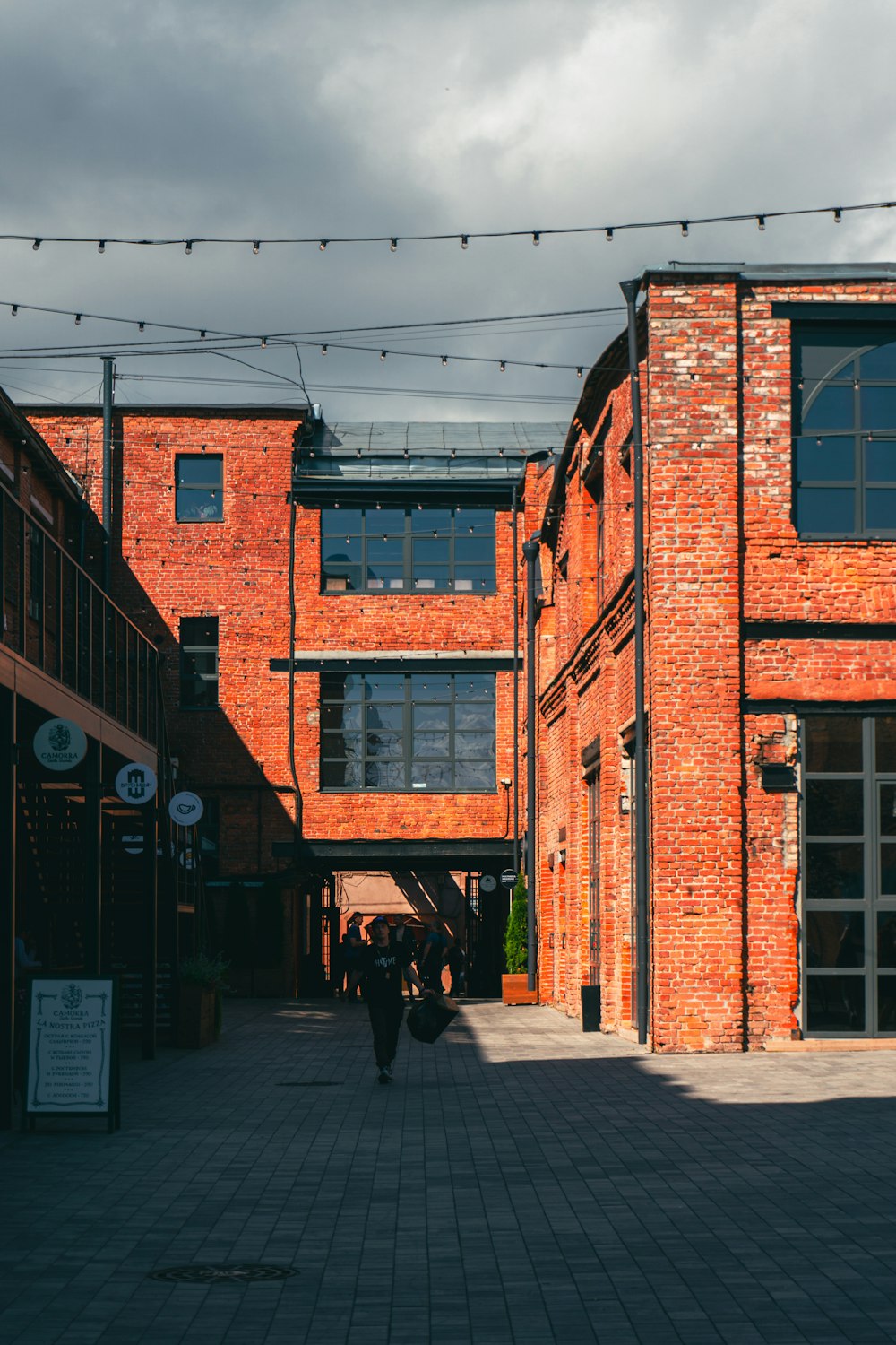 a brick building with a brick walkway