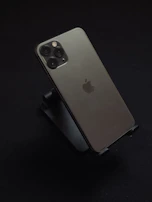 The advanced triple-camera system of the iPhone 17 with macro and night mode lenses visible.