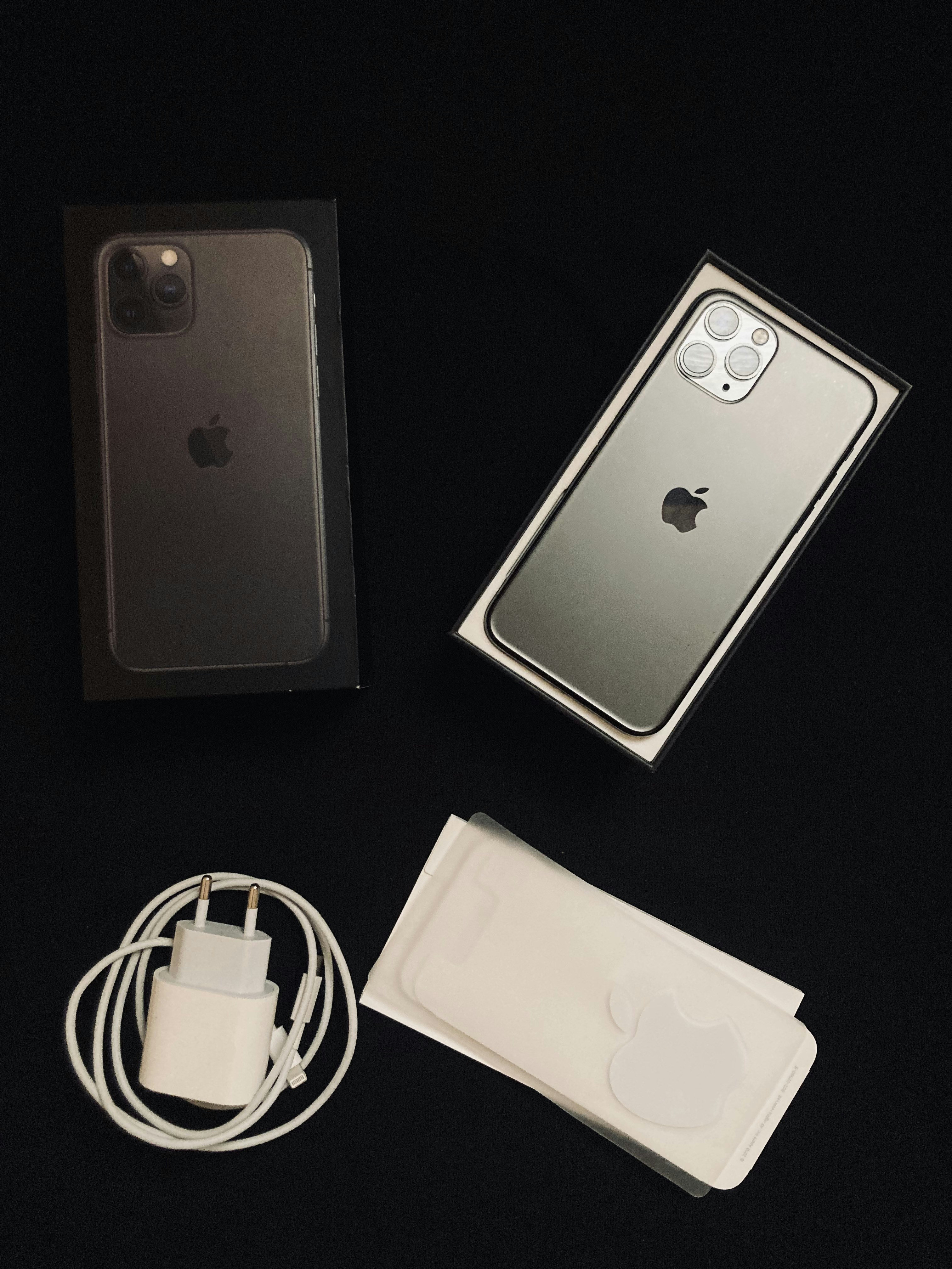 iPhone accessories collection including MagSafe charger and cases on clean background