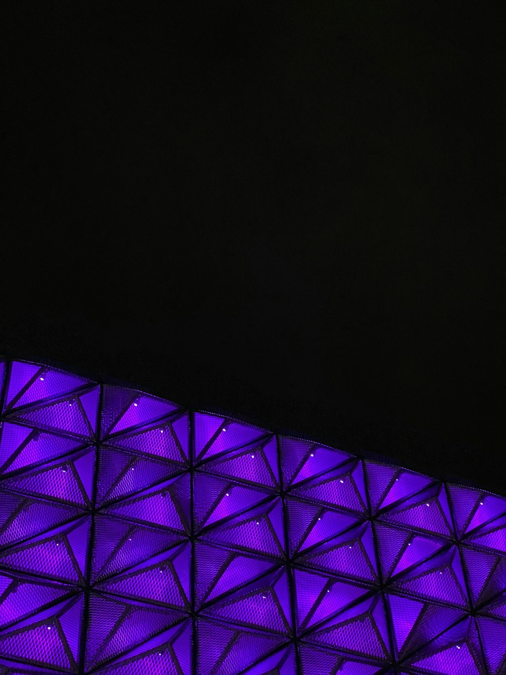 a purple and black background
