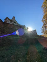 A wild sunbeam gently tracing patterns on an ancient stone surface.