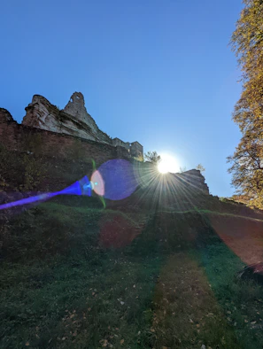 A wild sunbeam gently tracing patterns on an ancient stone surface.