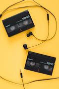 a black electronic device with a cable