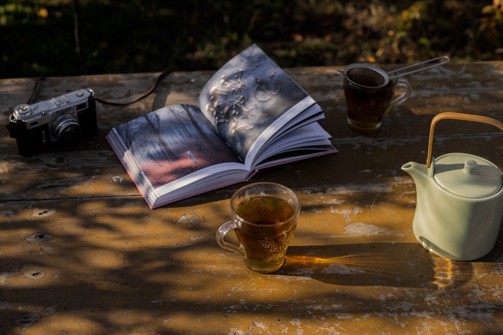 a newspaper and a mug of coffee on a table