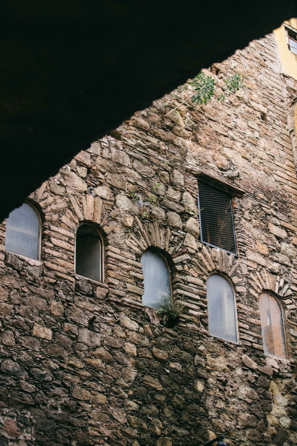 a stone building with windows