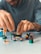 a man building a building blocks