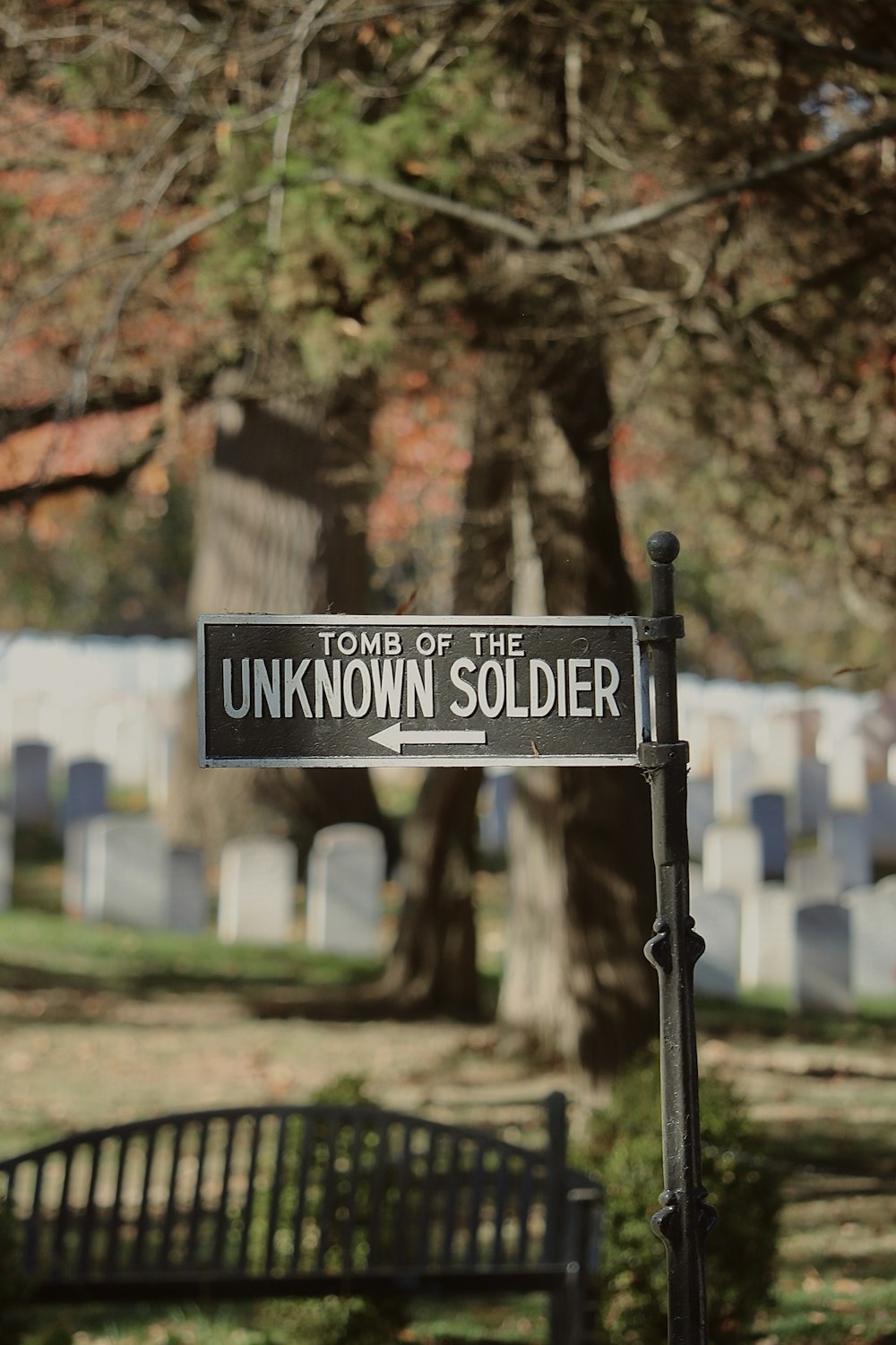 a street sign is posted on a pole