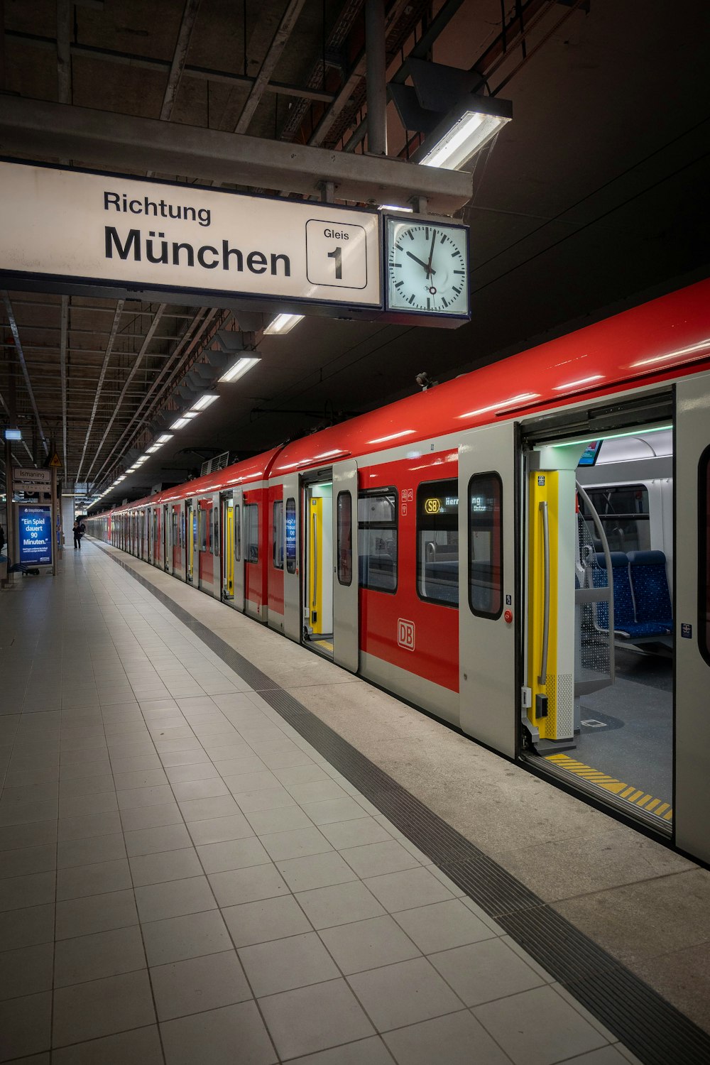 a train station with a clock