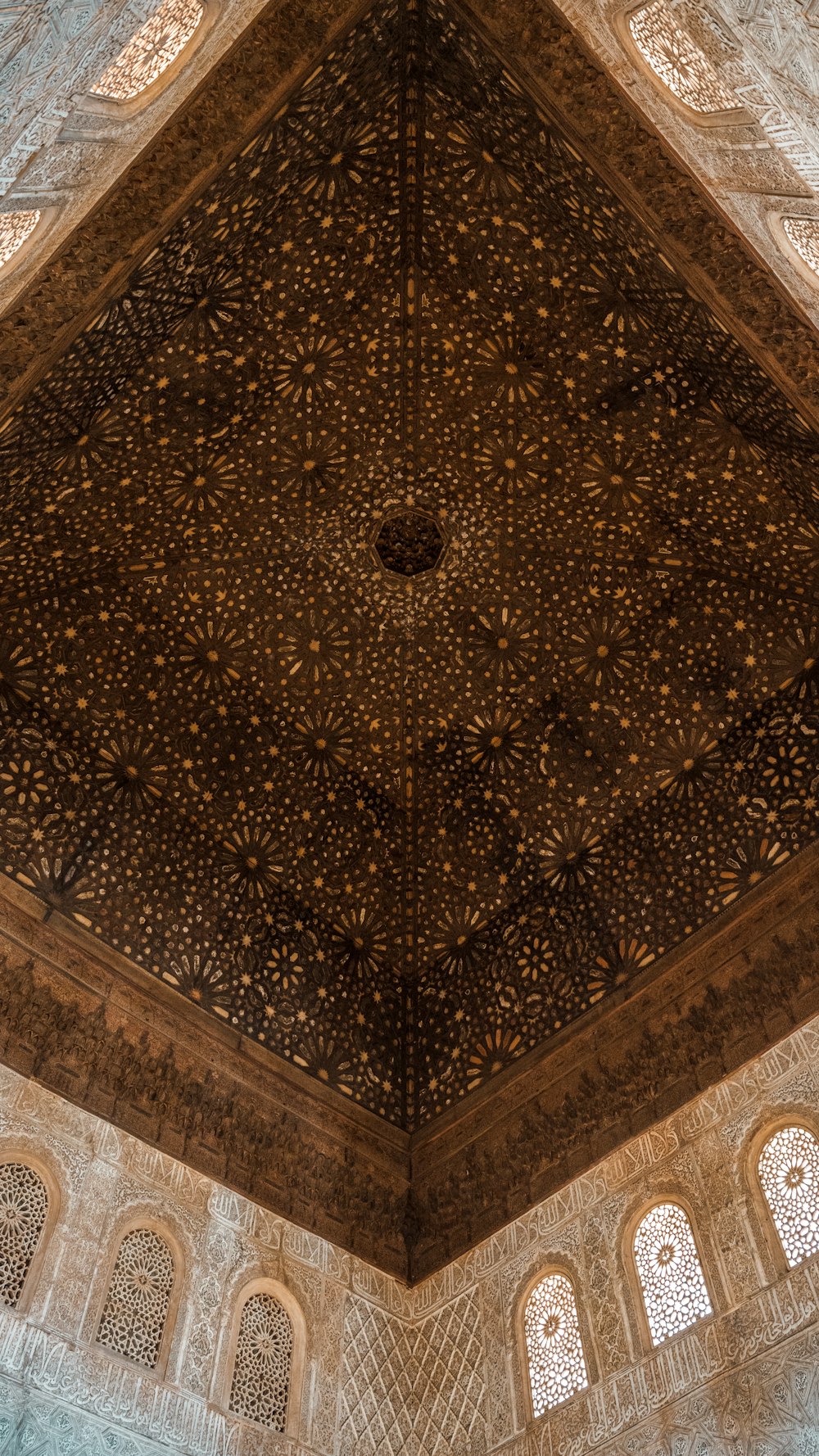 a ceiling with many arches