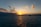 a sunset over a body of water